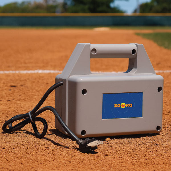 Zooka EB-1 External Battery used on the field to extend pitching machine runtime