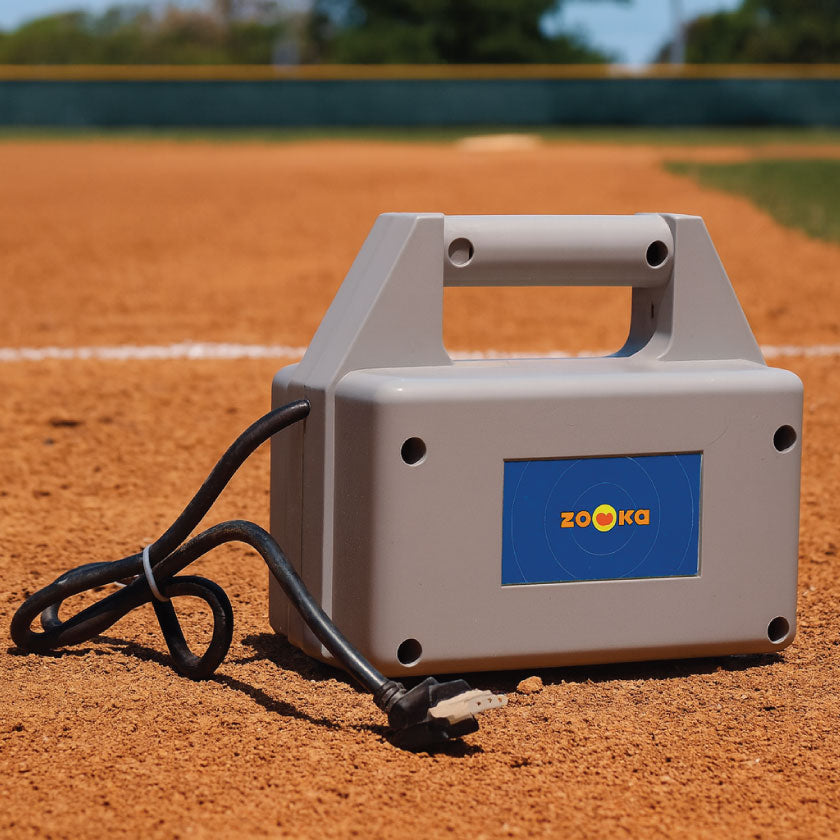 Zooka EB-1 External Battery used on the field to extend pitching machine runtime
